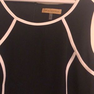 Woman’s sleeveless black dress from Nippon Boutique. Size 18W.